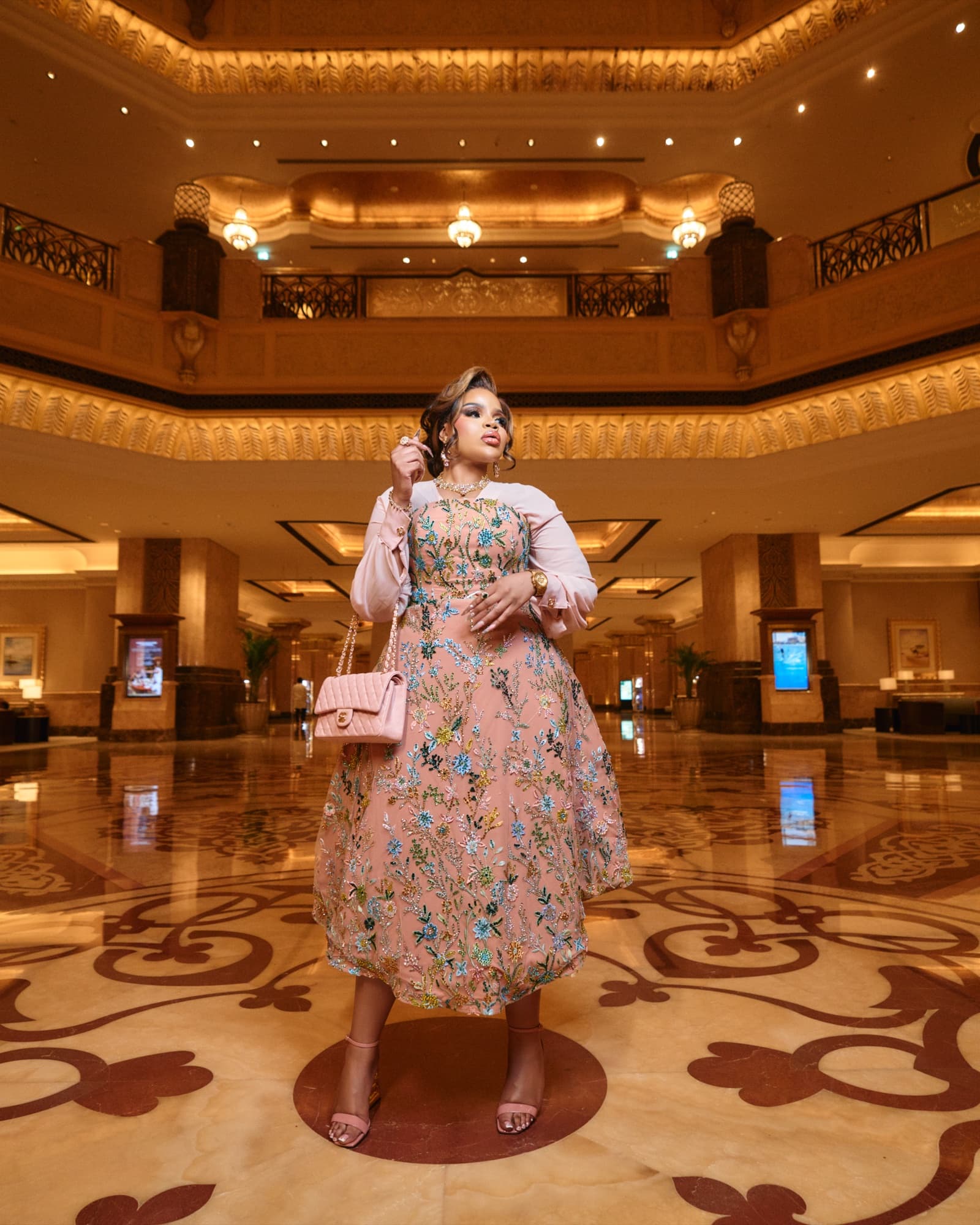 Editorial photography by Deine, floral gown at Emirates Palace lobby